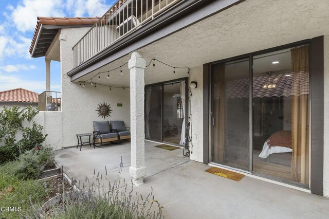 view of patio / terrace with a balcony