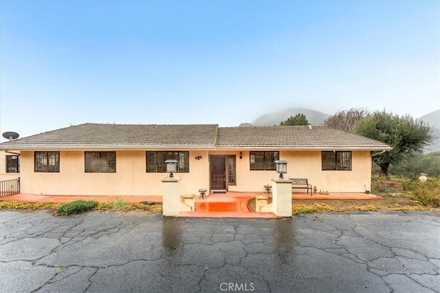 view of front of home with a patio