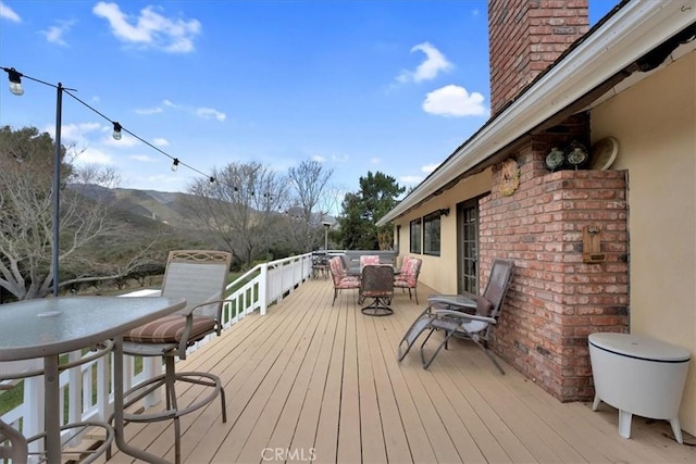 deck with a mountain view