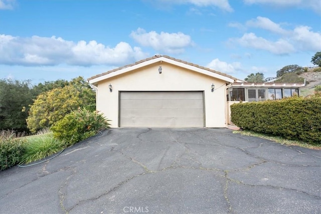 exterior space with a garage