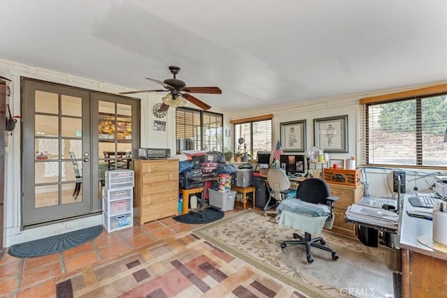 office area featuring french doors, ceiling fan, and tile patterned floors