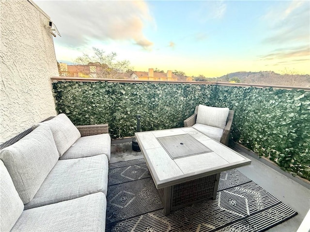 1430 E Foothill Blvd, Glendora, CA 91741 - balcony at dusk with an outdoor living space