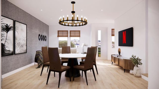 dining room featuring a chandelier and light wood-type flooring