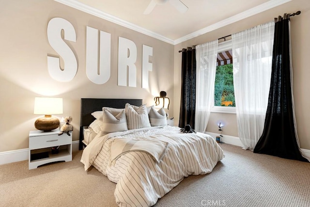 bedroom with crown molding, ceiling fan, and carpet