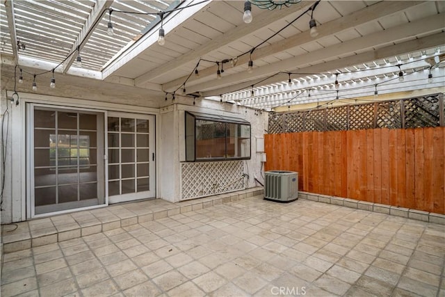 view of patio with fence, central AC unit, and a pergola