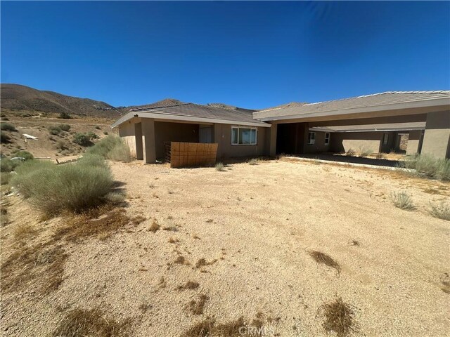 exterior space with a mountain view