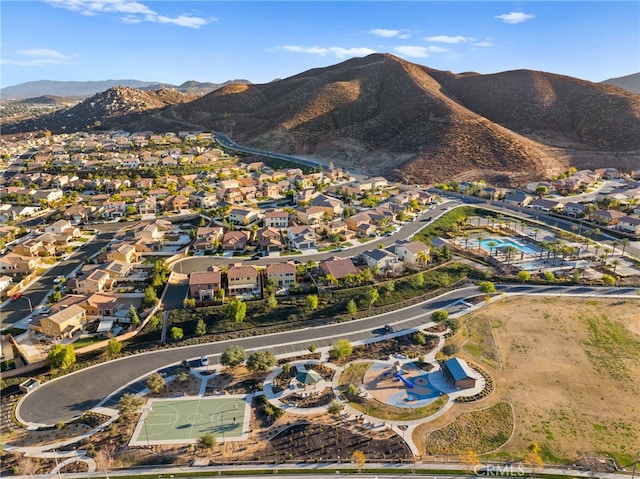 birds eye view of property featuring a mountain view