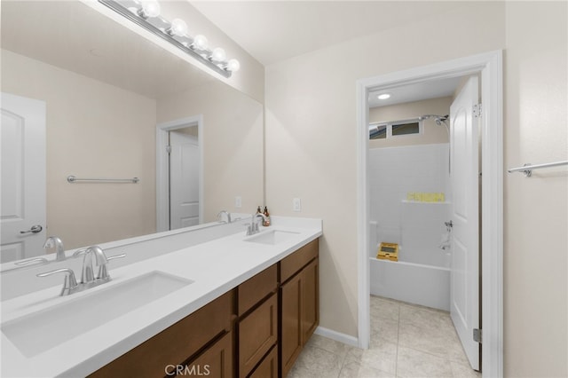 bathroom featuring vanity, shower / bath combination, and tile patterned flooring