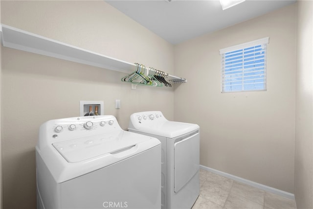 washroom with separate washer and dryer