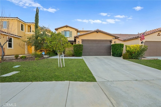 view of front of home with a garage and a front yard