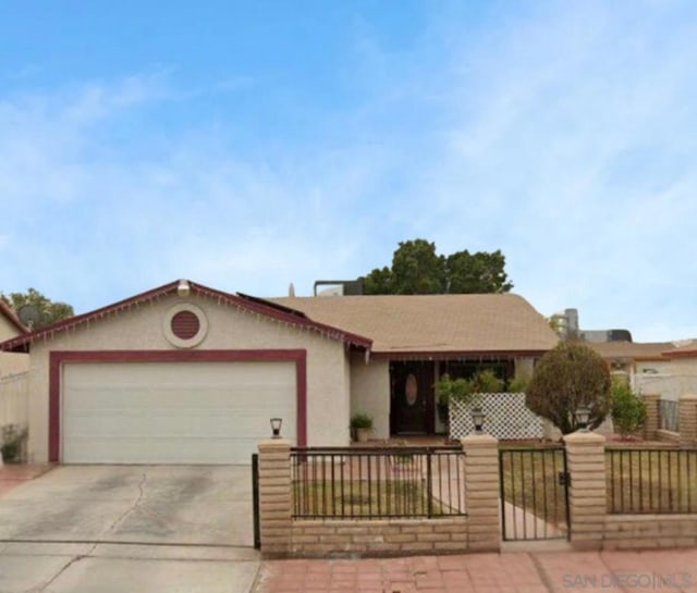 single story home with a garage