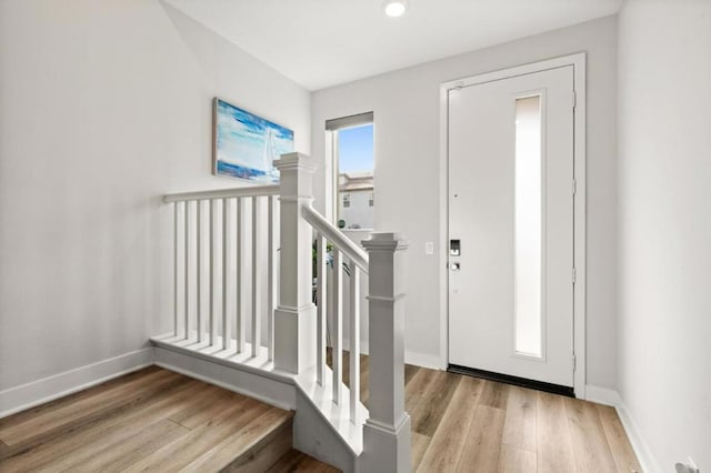 entrance foyer with light hardwood / wood-style flooring