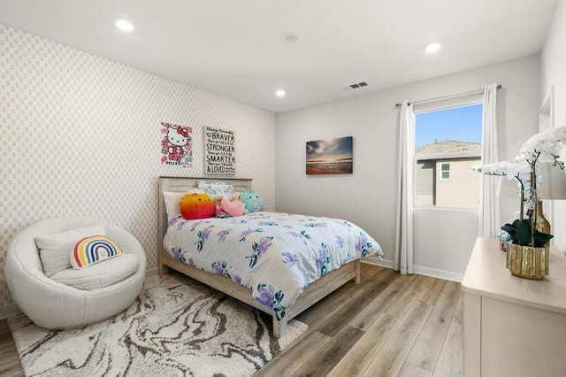 bedroom featuring wood-type flooring