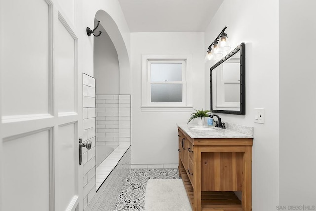 bathroom with vanity and tile patterned flooring