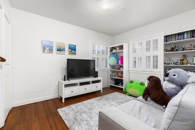 living room featuring dark wood-type flooring