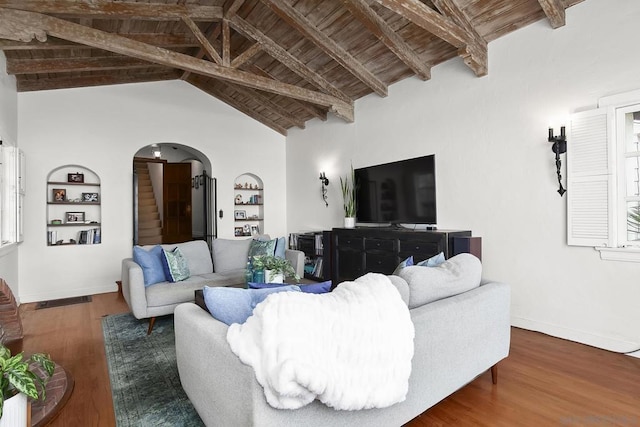 living room with built in features, beam ceiling, high vaulted ceiling, dark hardwood / wood-style flooring, and wooden ceiling