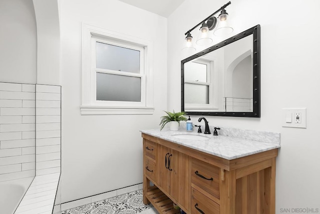 bathroom with vanity and tile patterned floors