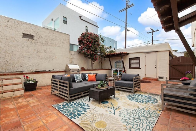 view of patio / terrace featuring a grill and an outdoor hangout area