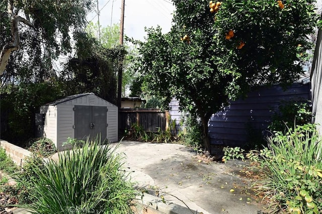 exterior space with a storage shed