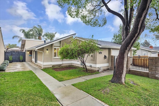 ranch-style home featuring a front yard