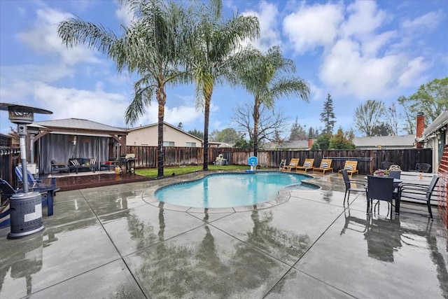 view of pool featuring a gazebo and a patio