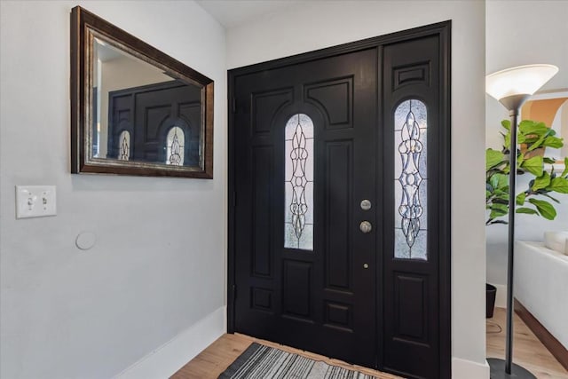 entrance foyer with light hardwood / wood-style floors