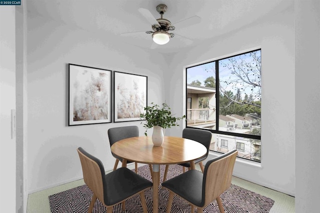 dining space with ceiling fan