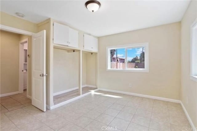 unfurnished bedroom featuring a closet