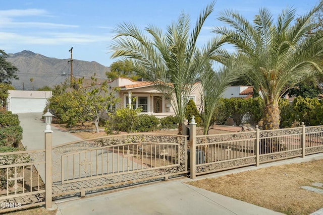 view of front of home featuring a mountain view