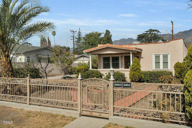 view of front of house featuring a mountain view