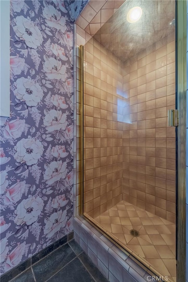 bathroom featuring walk in shower and tile patterned floors