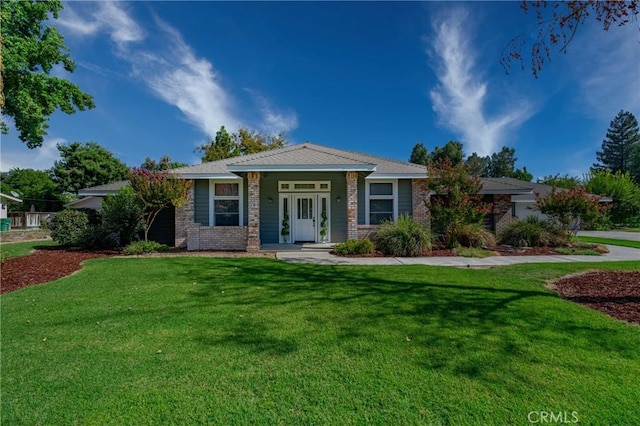 view of front of home with a front yard