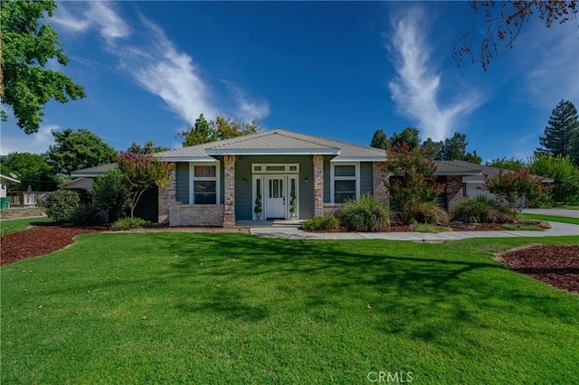 ranch-style house featuring a front yard
