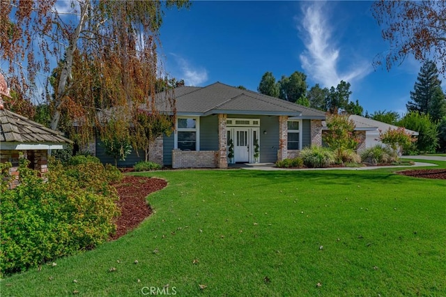 view of front of home with a front yard