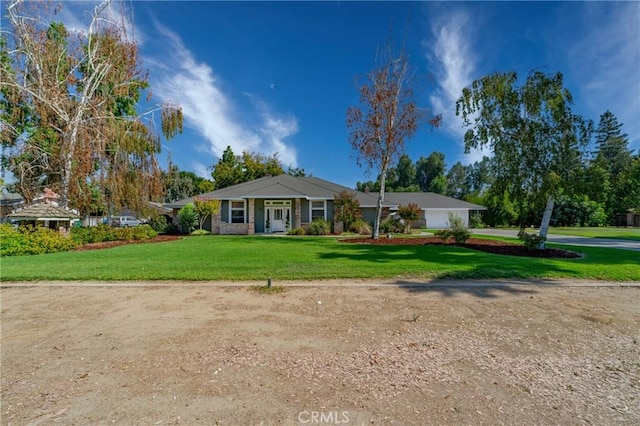 ranch-style home with a front yard