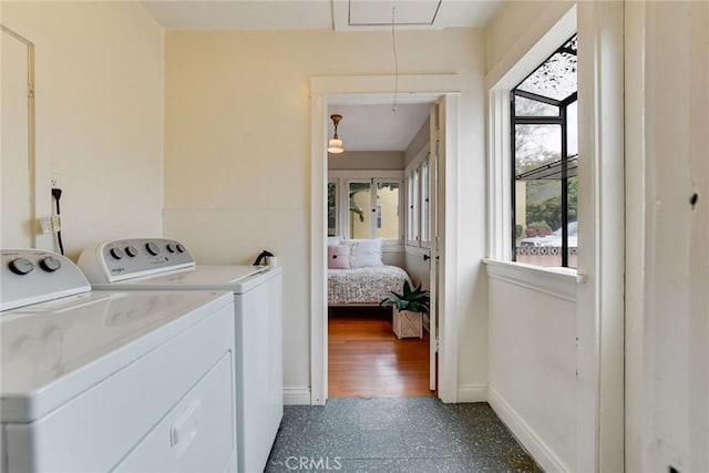 laundry area featuring separate washer and dryer