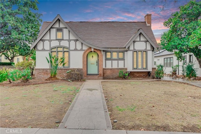 view of tudor-style house