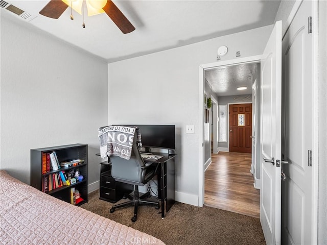 carpeted bedroom featuring ceiling fan