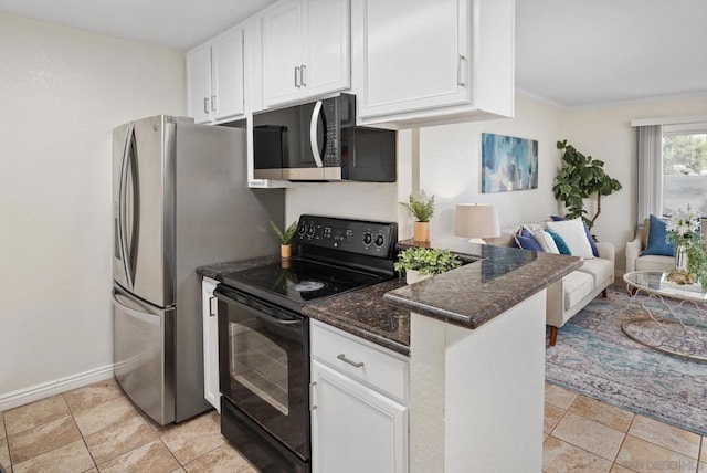 kitchen featuring stainless steel appliances, crown molding, white cabinets, and dark stone counters