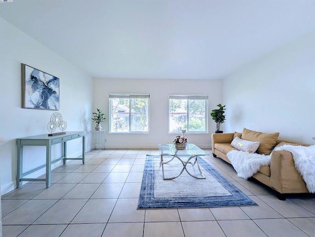 living room with light tile patterned flooring