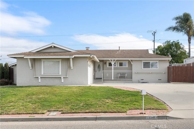 ranch-style house with a porch and a front yard