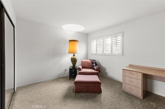 living area with carpet floors