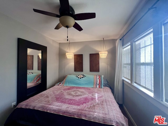 bedroom featuring ceiling fan