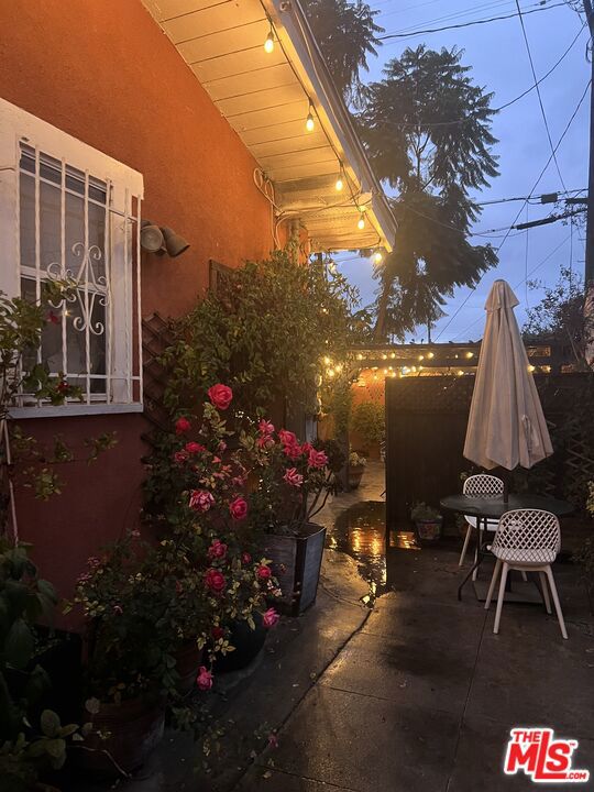 view of patio terrace at dusk