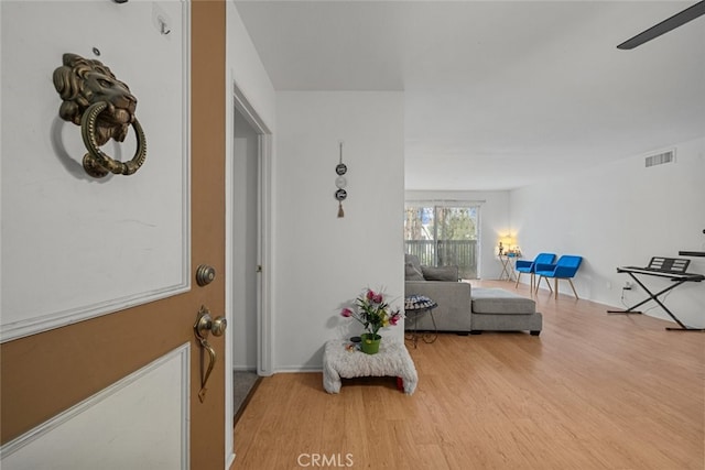 living area featuring hardwood / wood-style flooring