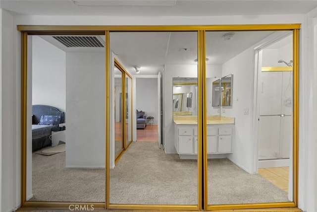 bathroom with vanity and an enclosed shower