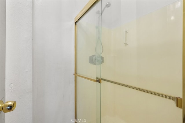 bathroom with an enclosed shower