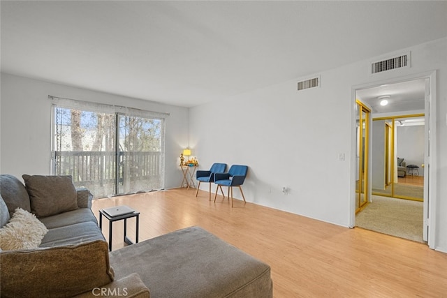 living room with hardwood / wood-style flooring