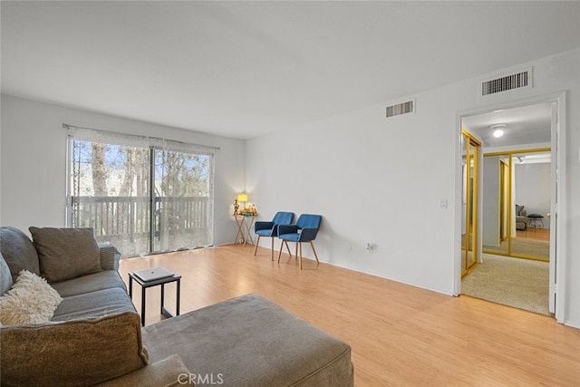 living room with hardwood / wood-style flooring