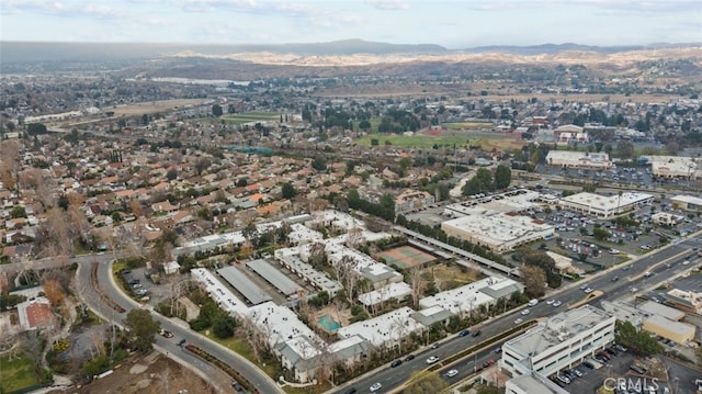 drone / aerial view featuring a mountain view